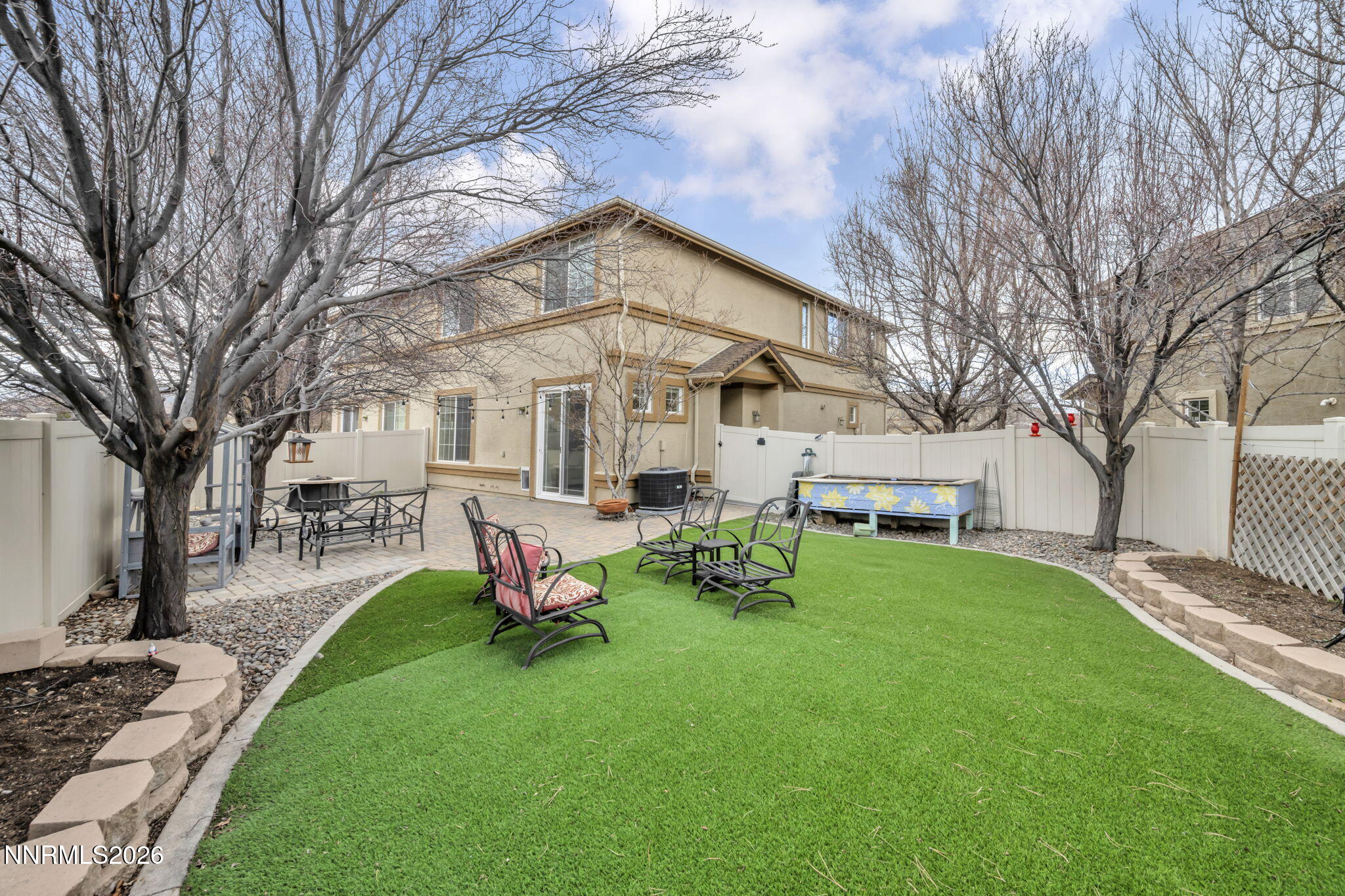 11010 Colton Drive Reno, NV 89521 - Photo 26 of 27 a view of a house with backyard and a sitting area