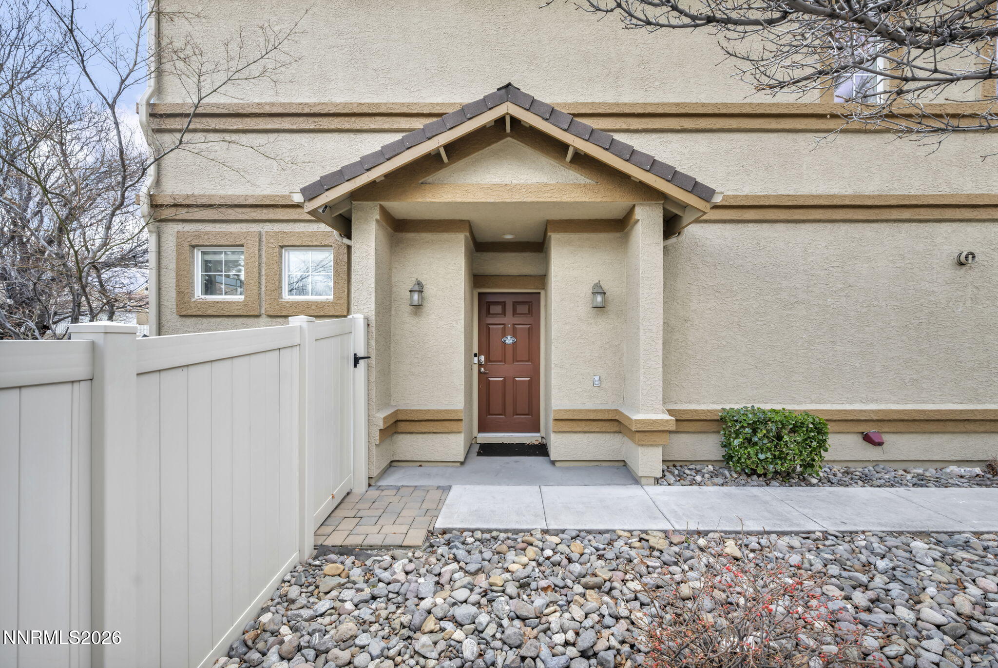 11010 Colton Drive Reno, NV 89521 - Photo 4 of 27 a front view of a house with garden