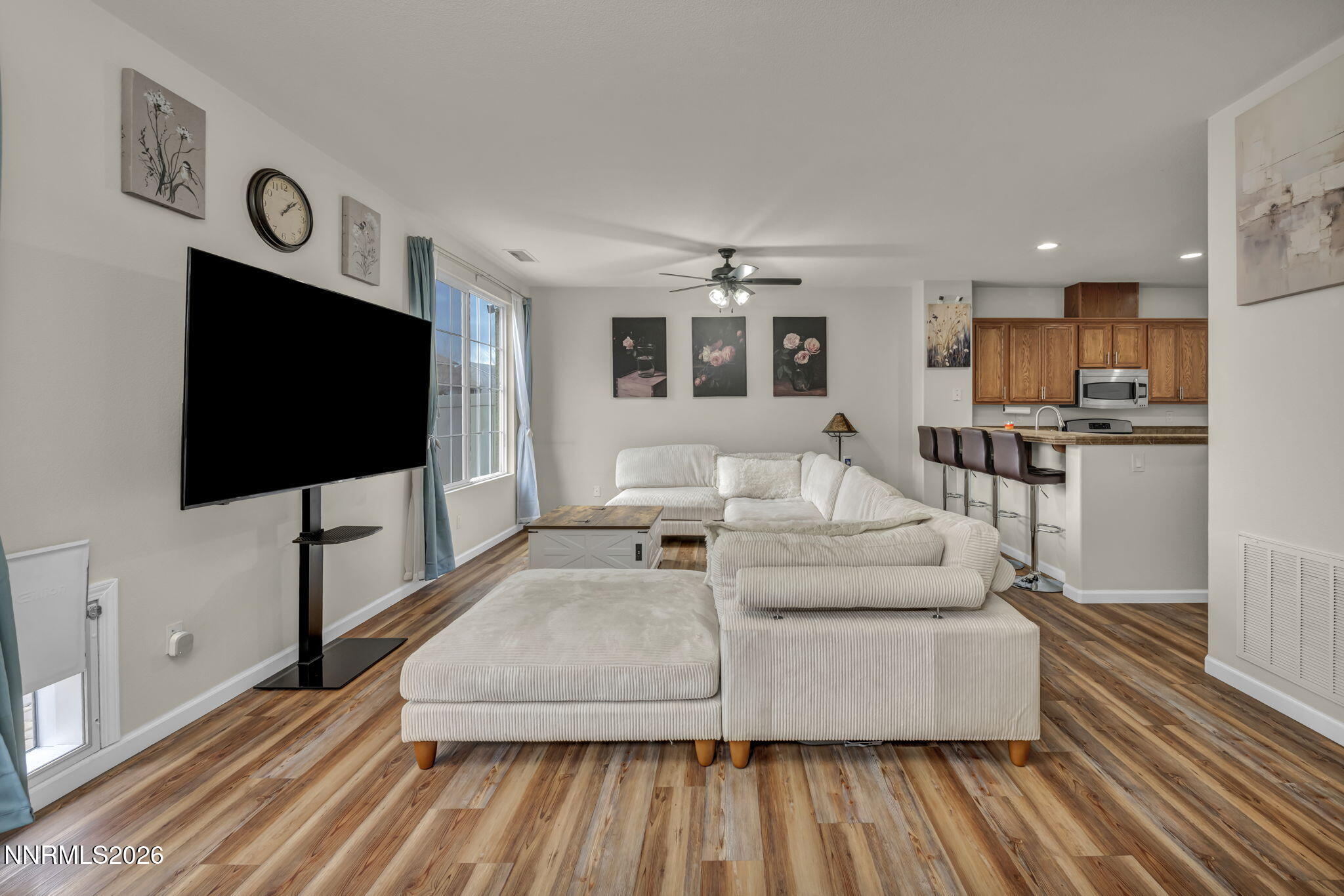 11010 Colton Drive Reno, NV 89521 - Photo 5 of 27 a living room with furniture and a flat screen tv