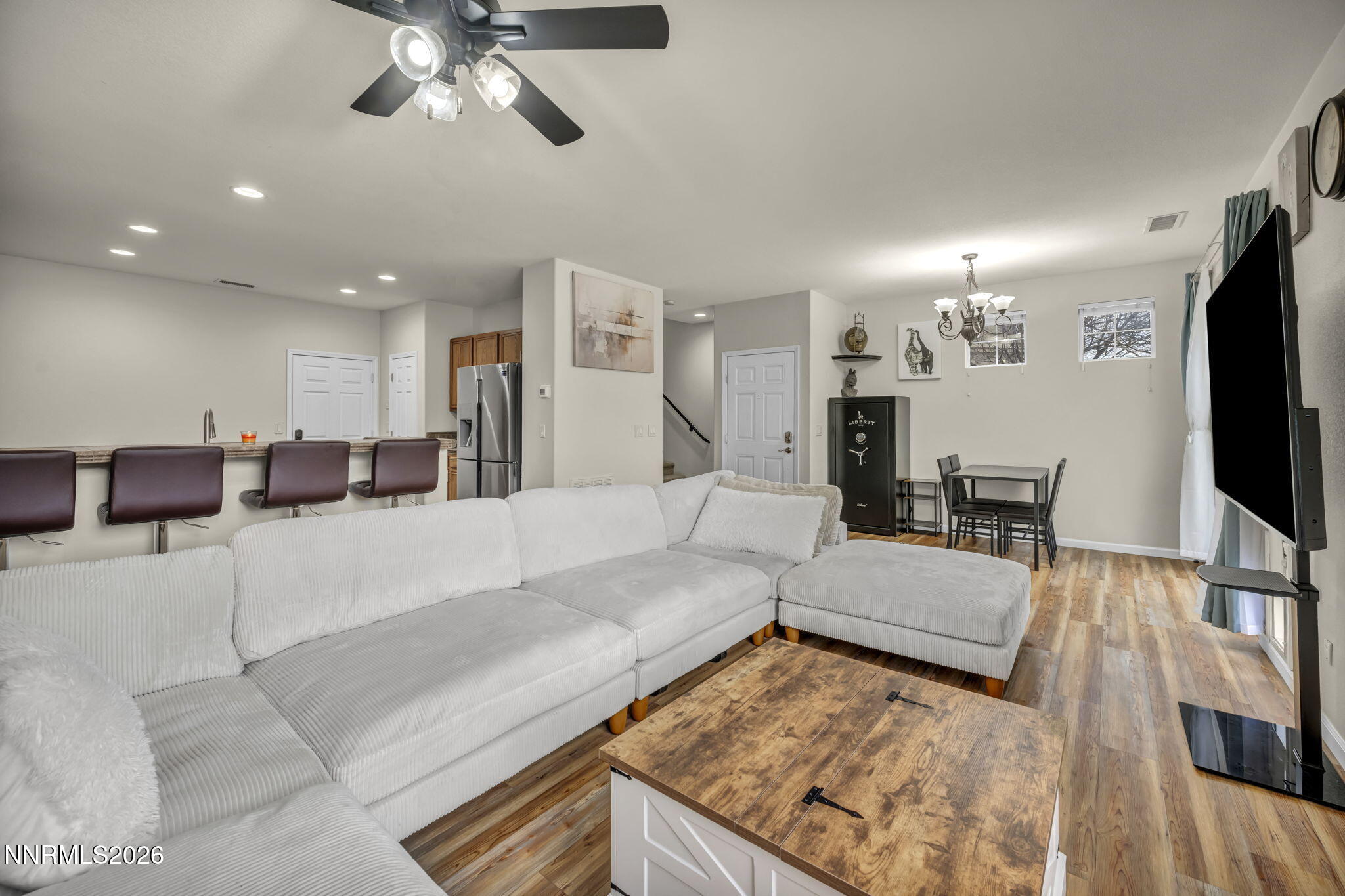 11010 Colton Drive Reno, NV 89521 - Photo 7 of 27 a living room with furniture and a flat screen tv