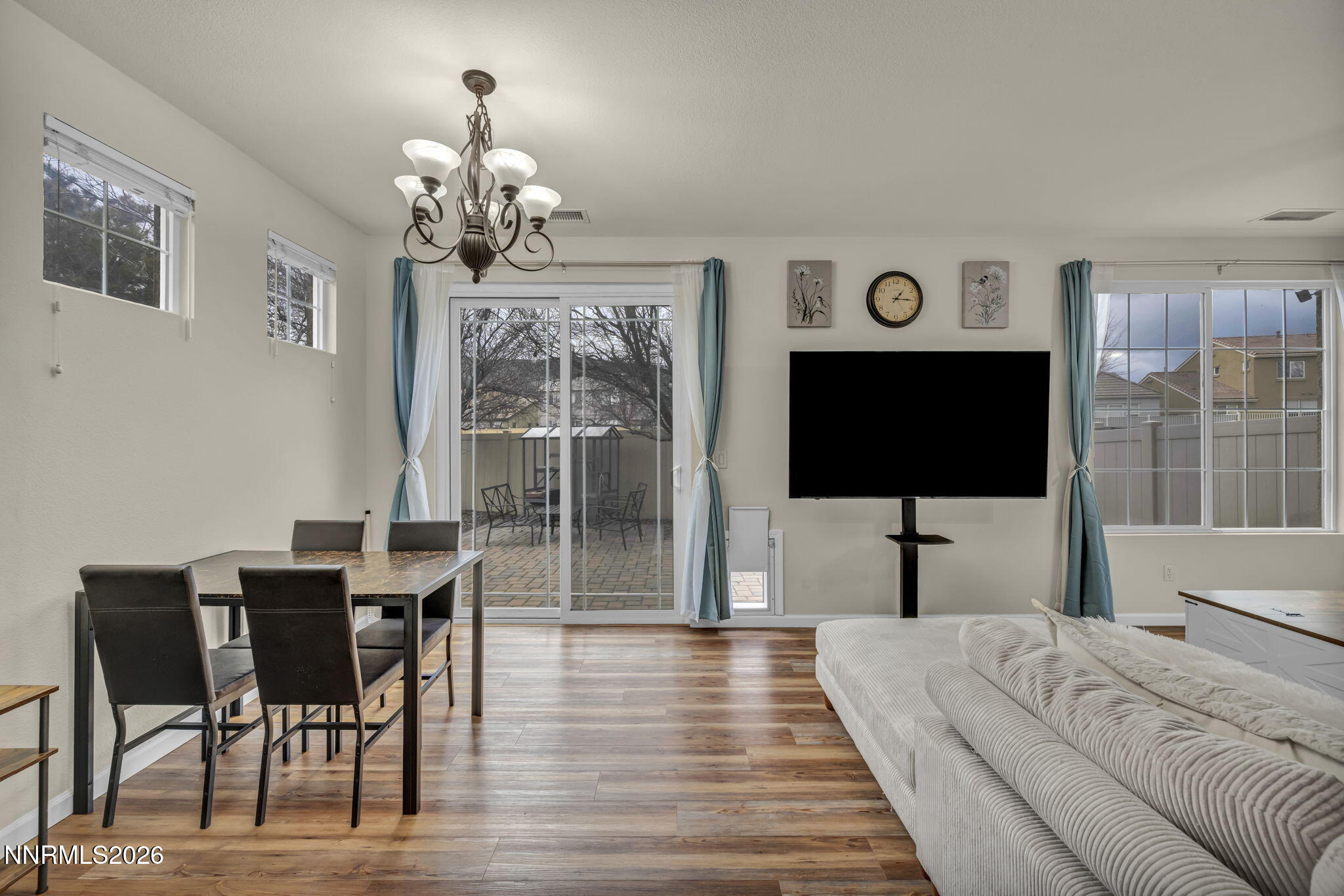 11010 Colton Drive Reno, NV 89521 - Photo 8 of 27 a bedroom with a bed and a flat screen tv