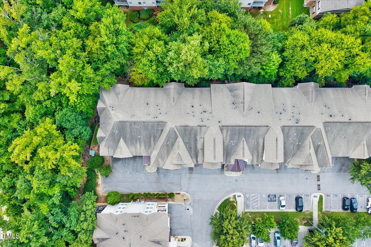Undisclosed Address Raleigh, NC 27604 - Photo 13 of 22 an aerial view of residential house with outdoor space