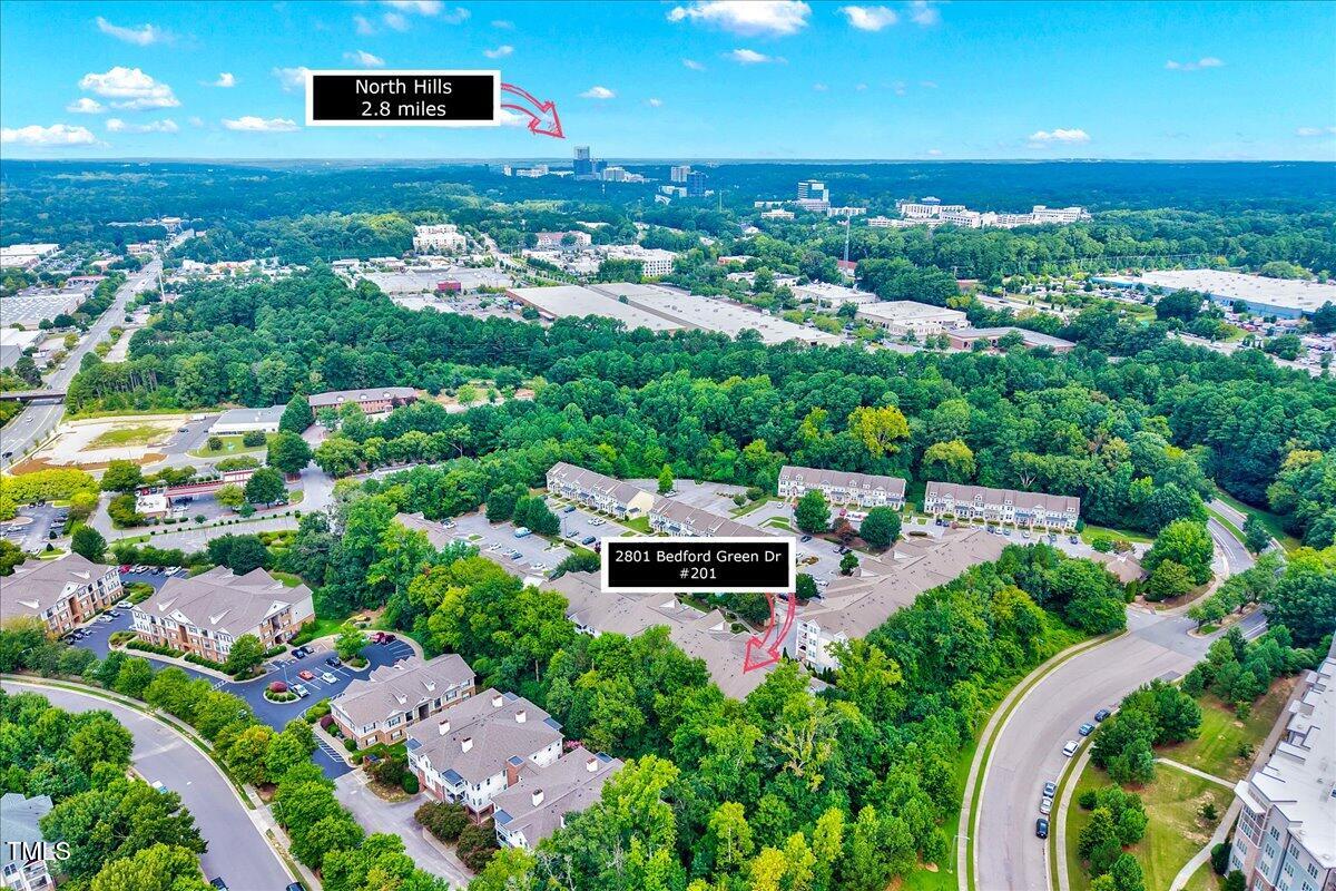 Undisclosed Address Raleigh, NC 27604 - Photo 18 of 22 an aerial view of a house with a garden