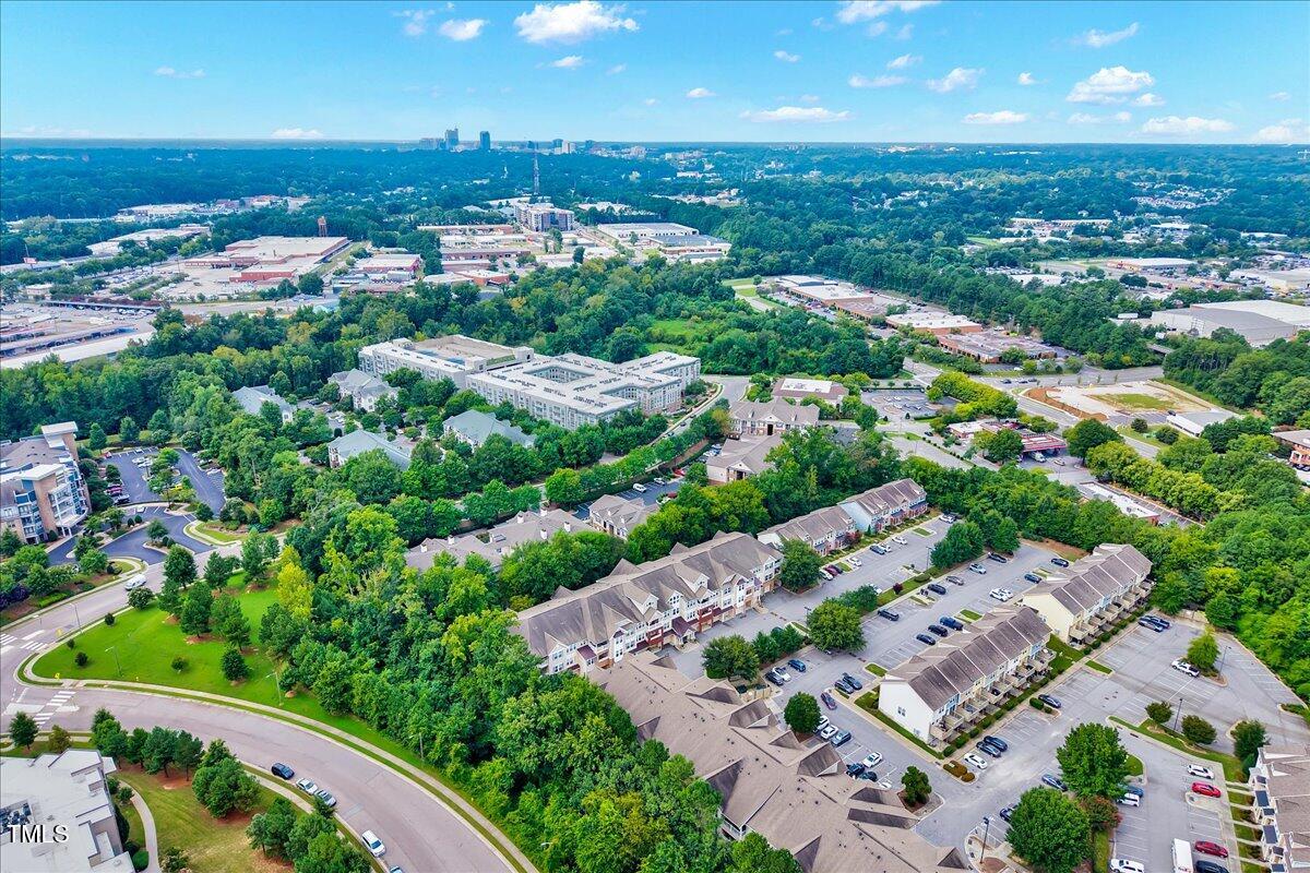 Undisclosed Address Raleigh, NC 27604 - Photo 19 of 22 an aerial view of a house with a garden