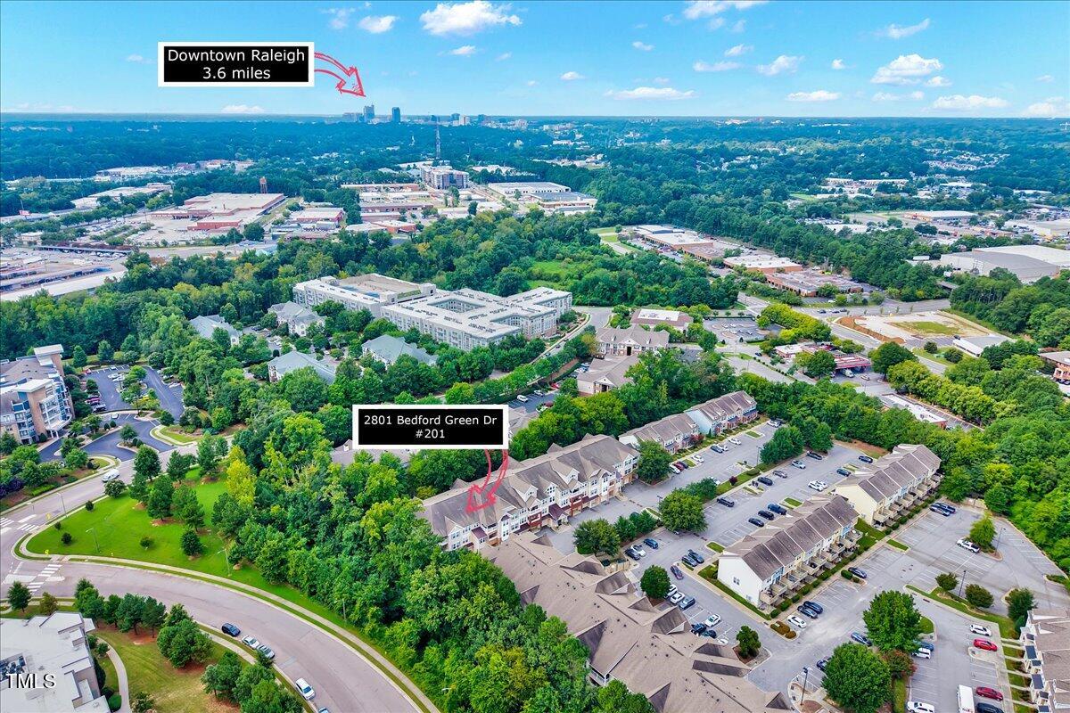 Undisclosed Address Raleigh, NC 27604 - Photo 20 of 22 an aerial view of a house with yard swimming pool and outdoor seating