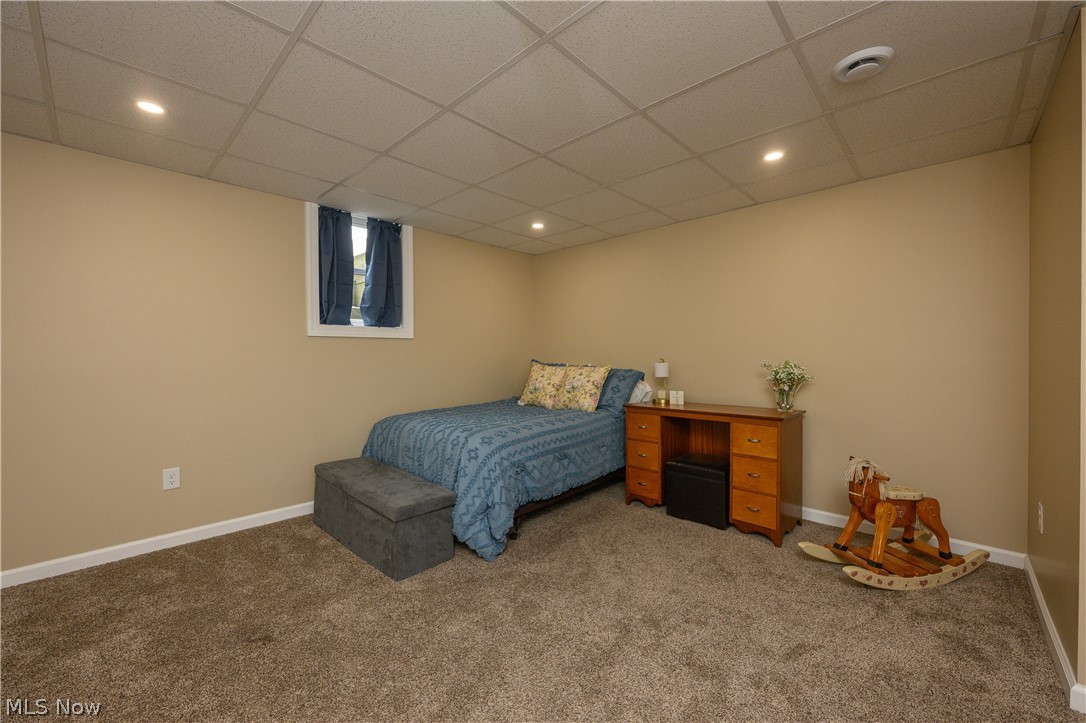 806 Forrest Ridge Drive Dover, OH 44622 - Photo 34 of 36 Carpeted bedroom with a paneled ceiling and recessed lighting
