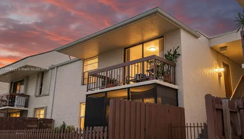 a view of balcony with a small yard
