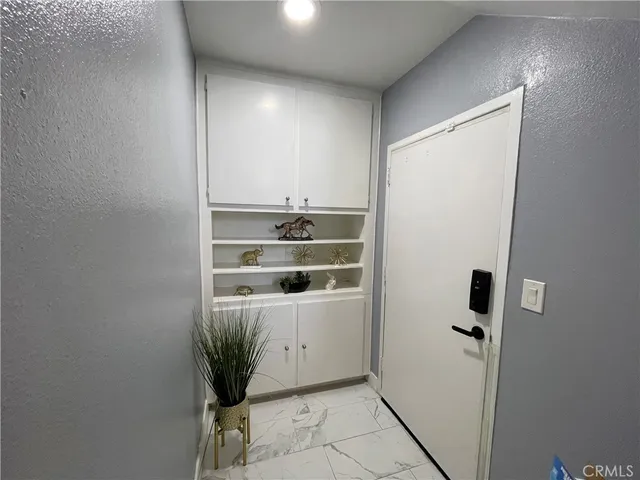 a view of a storage & utility room with washer and dryer