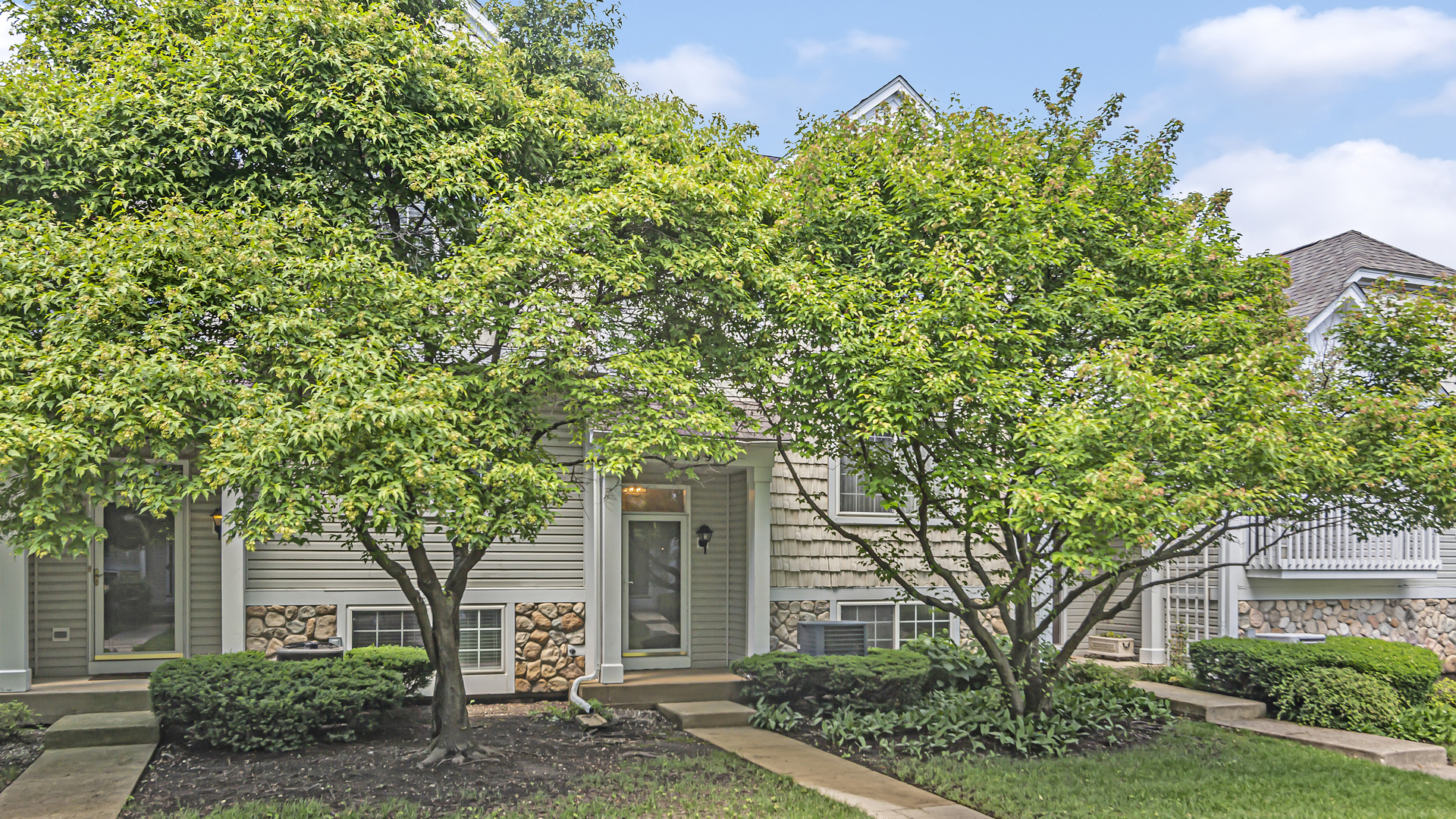 3159 Cambria Court Aurora, IL 60503 - Photo 1 of 21 front view of a house with a tree