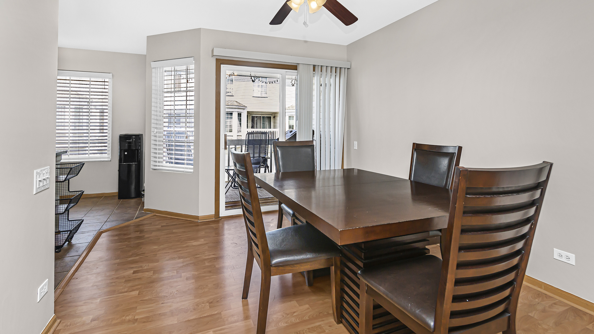 3159 Cambria Court Aurora, IL 60503 - Photo 5 of 21 a view of a dining room with furniture and wooden floor