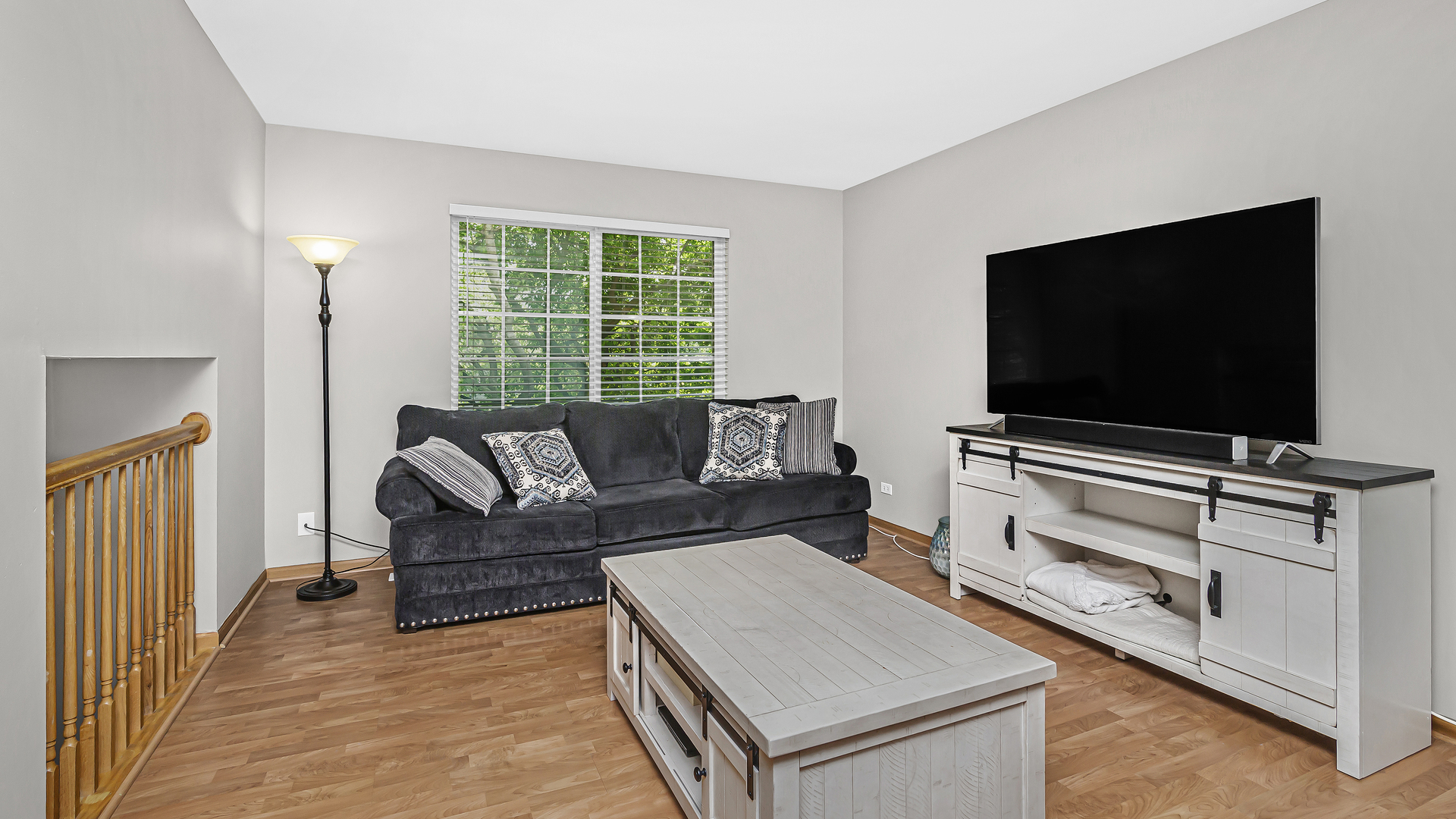 3159 Cambria Court Aurora, IL 60503 - Photo 7 of 21 a living room with furniture and a flat screen tv
