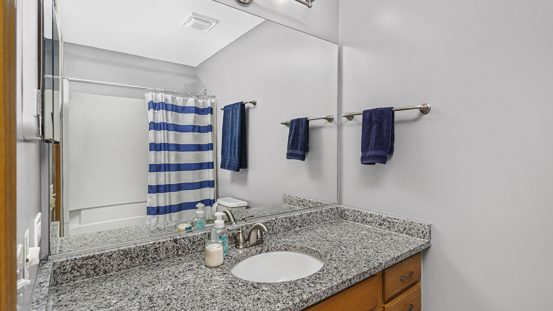 3159 Cambria Court Aurora, IL 60503 - Photo 10 of 21 a bathroom with a granite countertop sink and a mirror