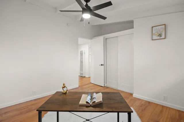 a view of a workspace with furniture