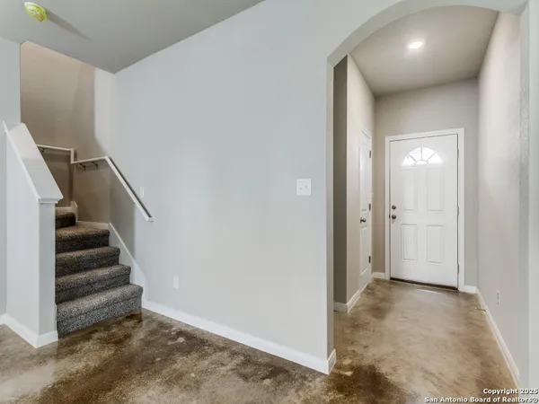 a view of entryway with stairs