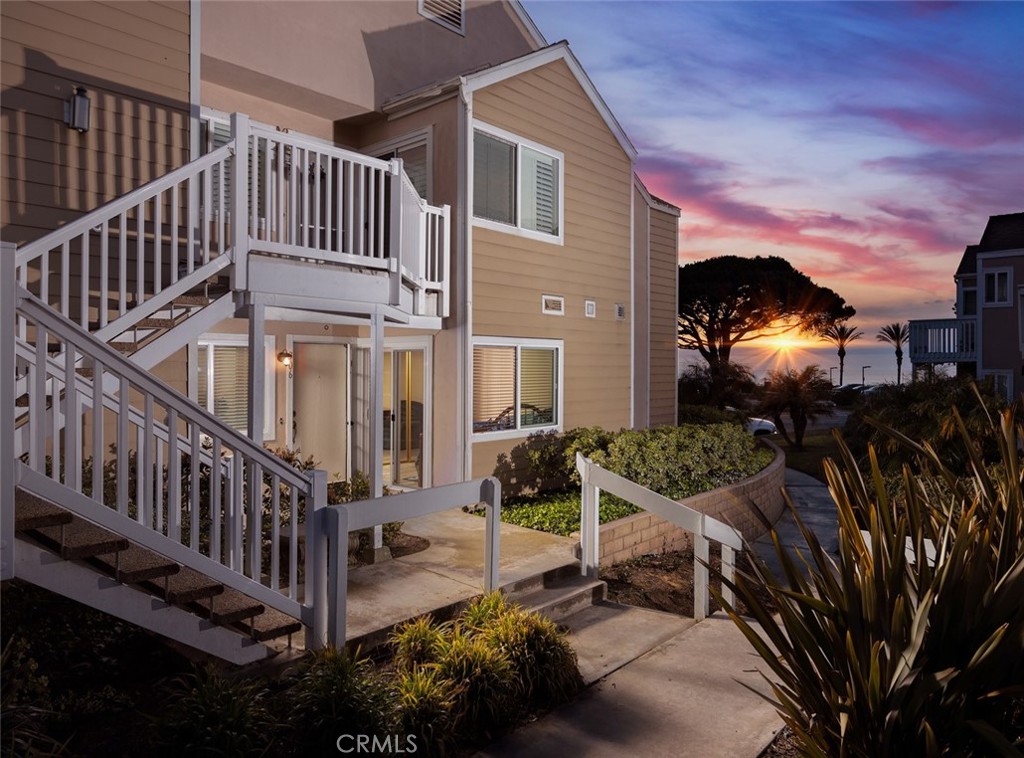 34116 Selva Road, Unit 306 Dana Point, CA 92629 - Photo 1 of 1 a view of a house with backyard and porch