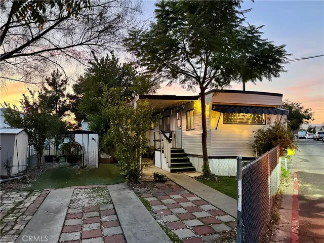 a sign board with a yard