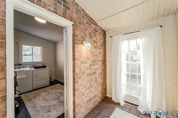 a view of a room with wooden floor and closet