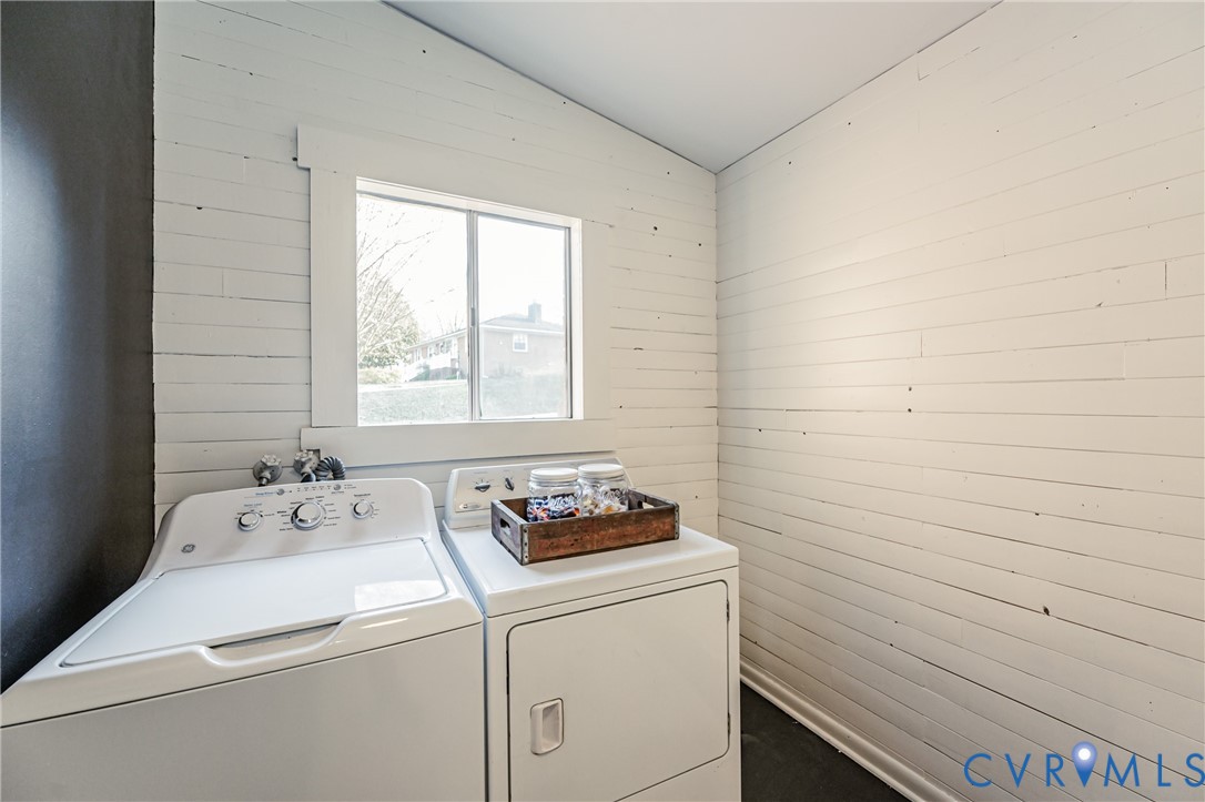 6048 Gainford Road Richmond, VA 23234 - Photo 46 of 83 Laundry area with vaulted ceiling, wooden walls, a