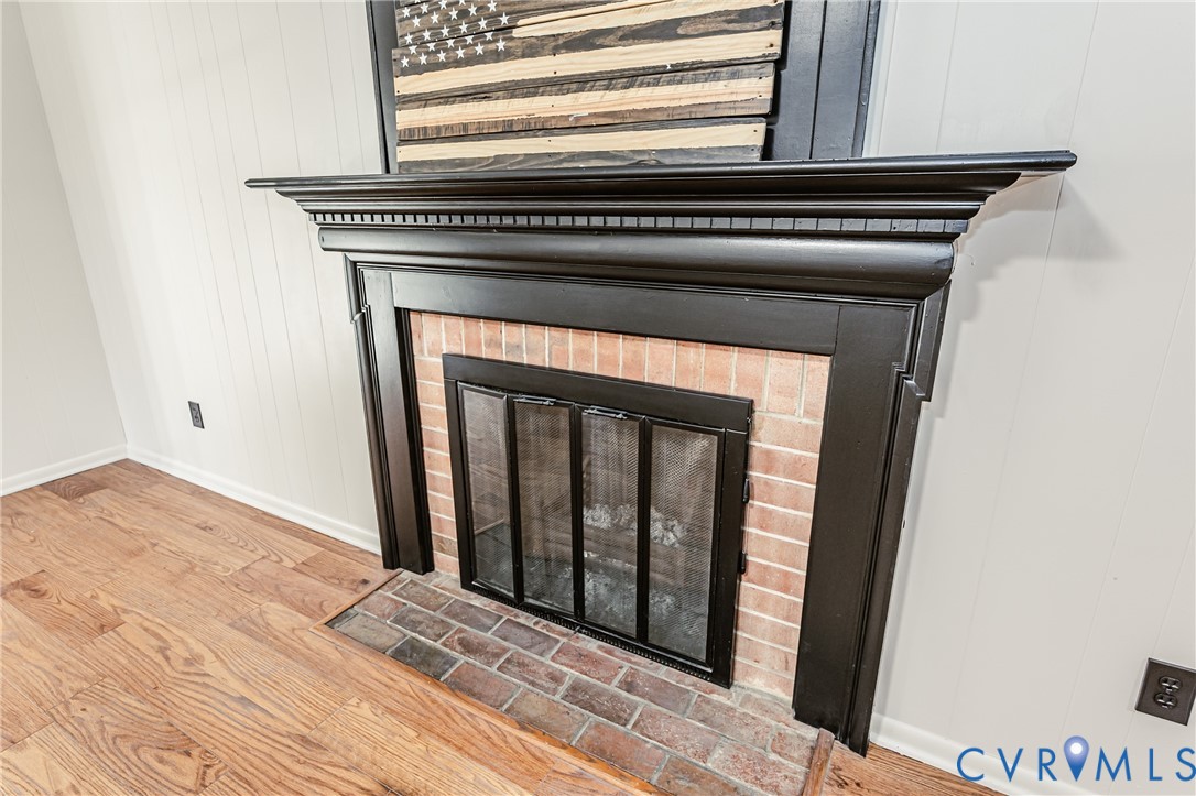 6048 Gainford Road Richmond, VA 23234 - Photo 49 of 83 Detailed view of wood finished floors, a fireplace
