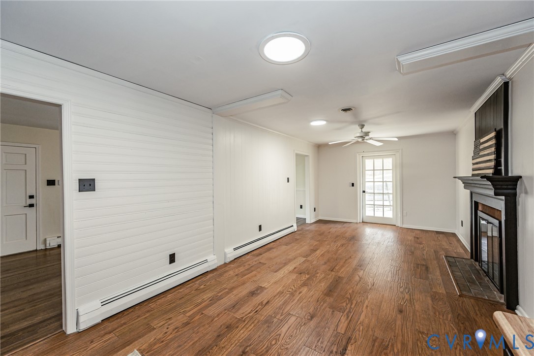 6048 Gainford Road Richmond, VA 23234 - Photo 55 of 83 Unfurnished living room featuring a baseboard heat