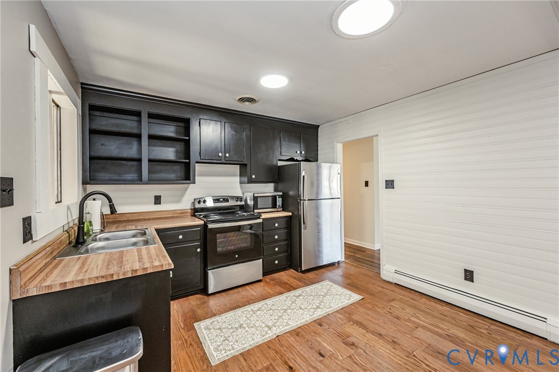 6048 Gainford Road Richmond, VA 23234 - Photo 58 of 83 Kitchen with light countertops, stainless steel ap