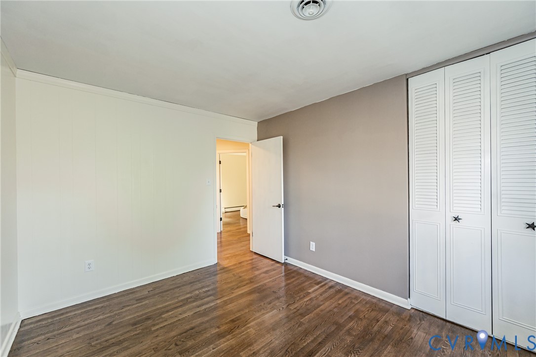 6048 Gainford Road Richmond, VA 23234 - Photo 81 of 83 Unfurnished bedroom with dark wood-style floors, a