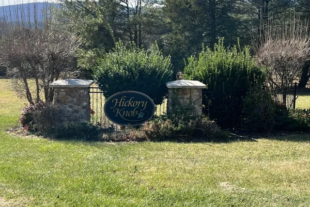 a view of a backyard of the house