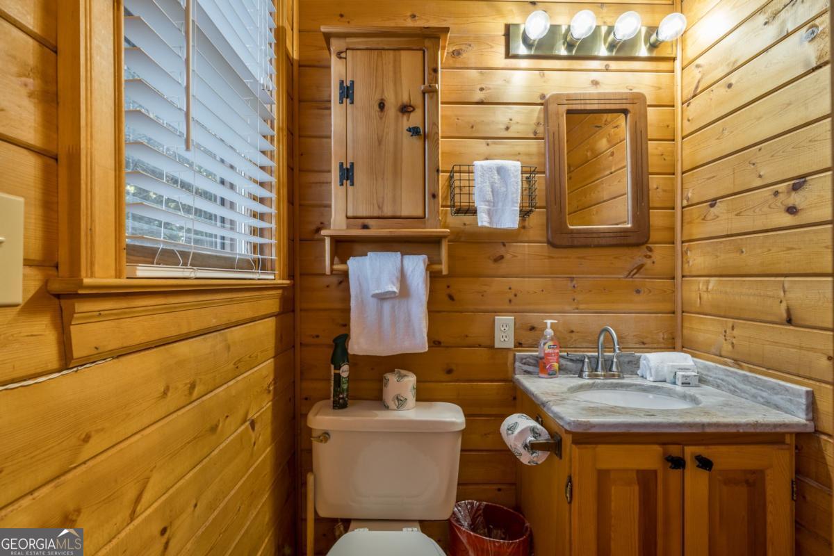 517 Ridge Road Blue Ridge, GA 30513 - Photo 26 of 56 a bathroom with a sink and a toilet