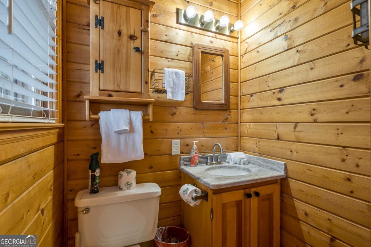 517 Ridge Road Blue Ridge, GA 30513 - Photo 27 of 56 a bathroom with a sink and toilet
