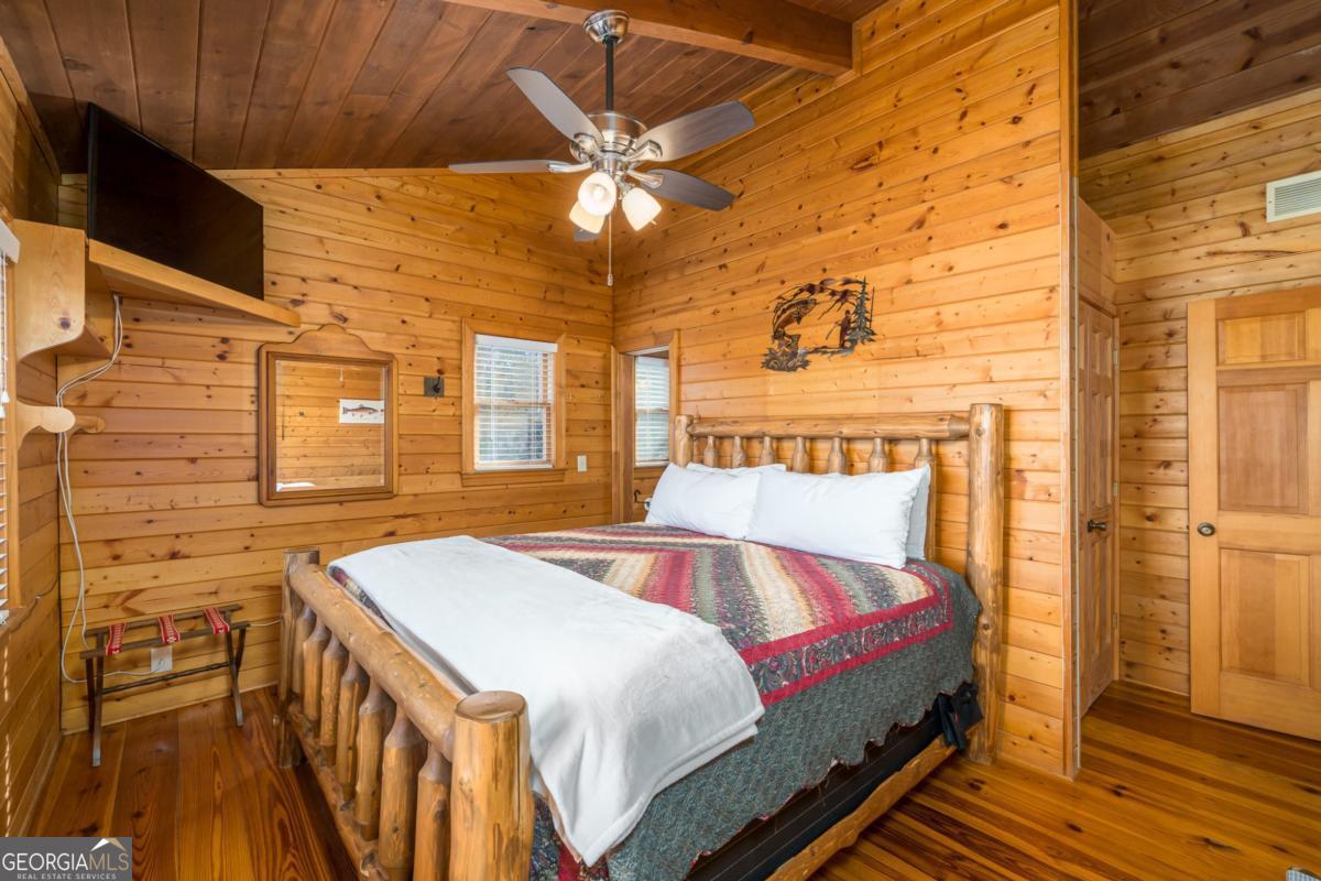 517 Ridge Road Blue Ridge, GA 30513 - Photo 30 of 56 a balcony with a table and chairs