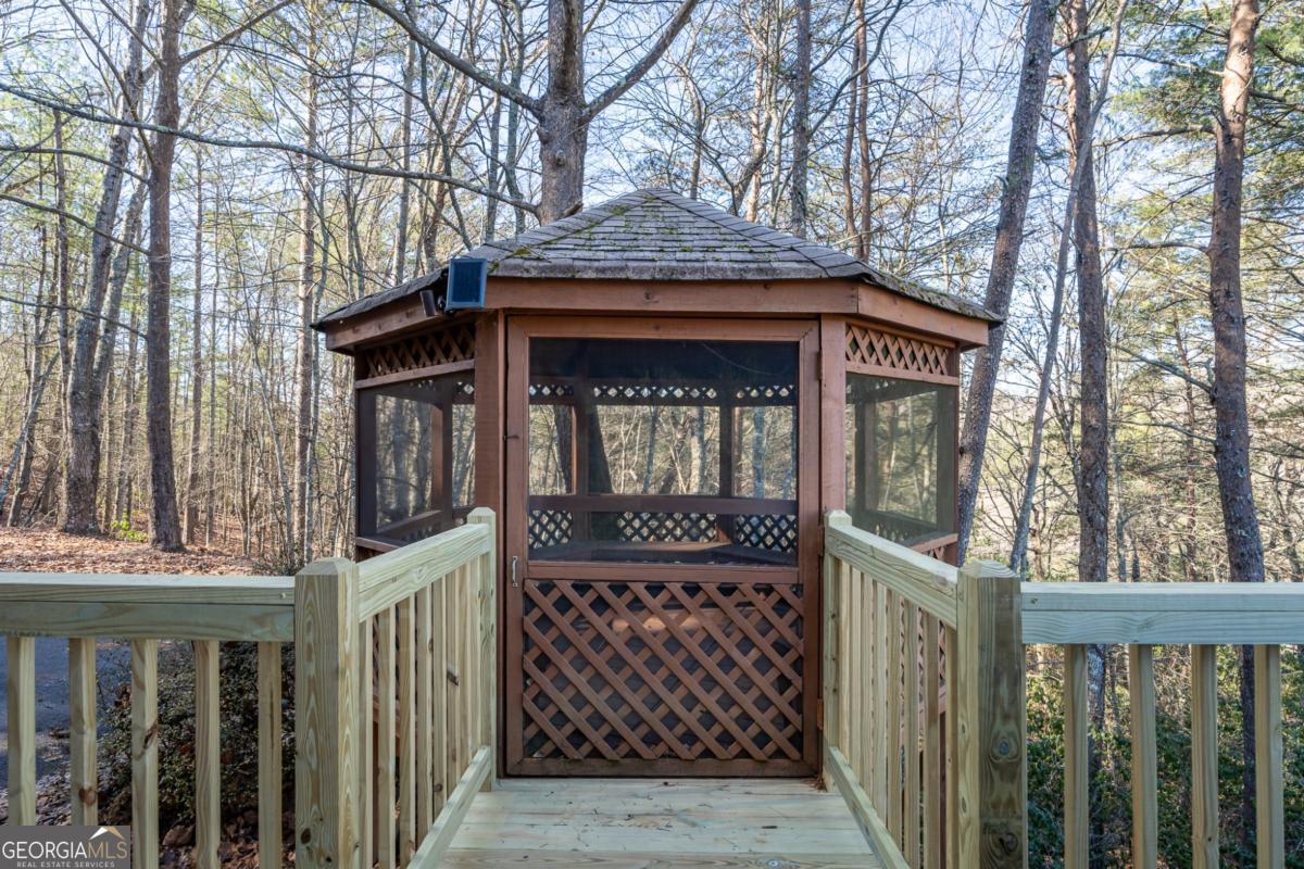 517 Ridge Road Blue Ridge, GA 30513 - Photo 36 of 56 a front view of a house with a yard