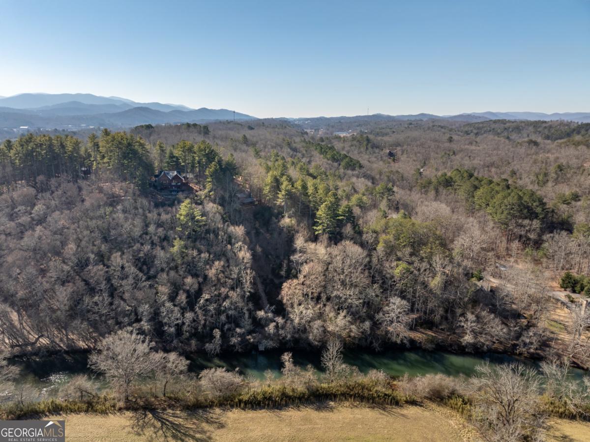 517 Ridge Road Blue Ridge, GA 30513 - Photo 54 of 56 a view of a lake with mountains in the background