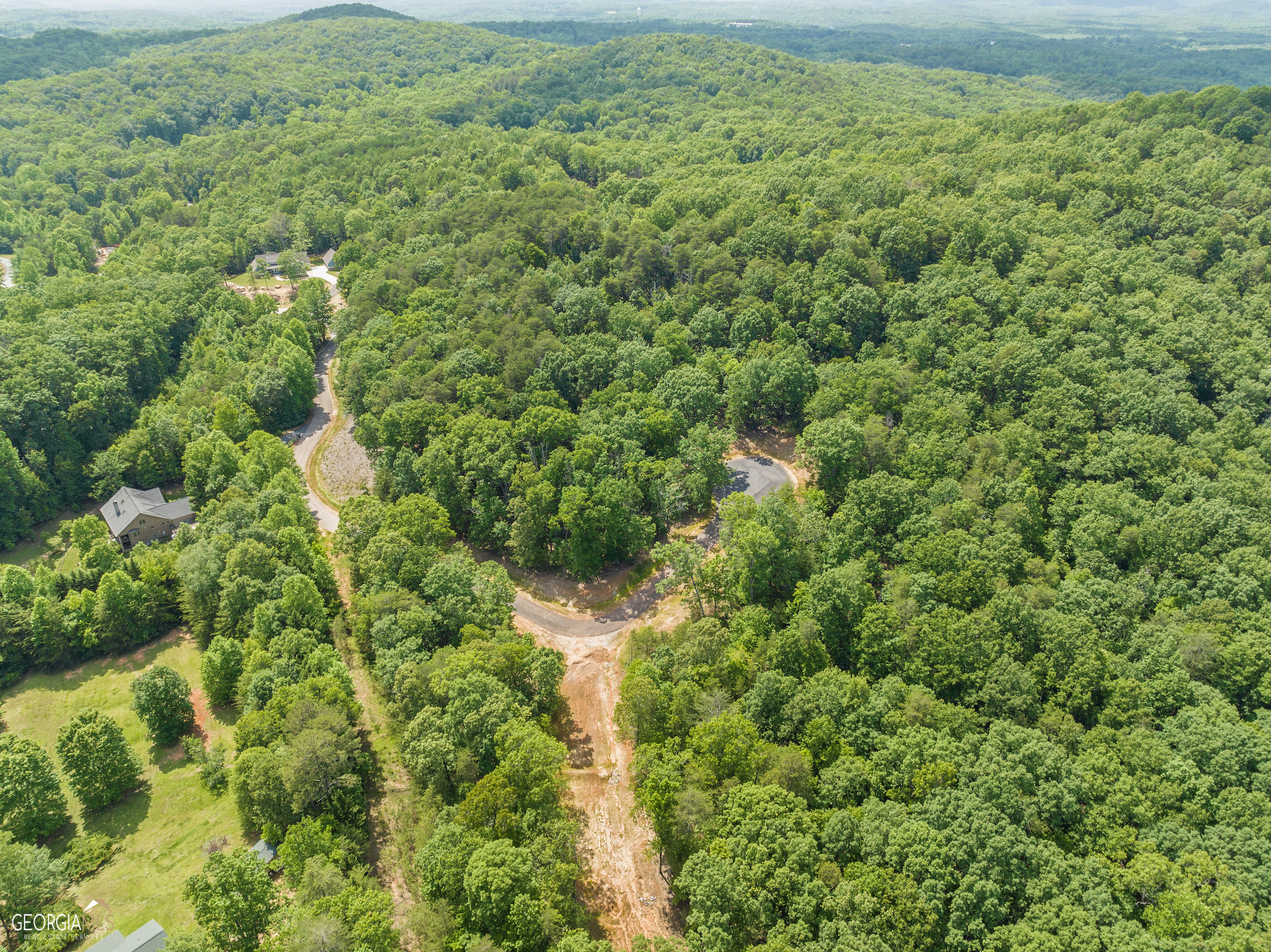35 Smokey Ridge Court Cleveland, GA 30528 - Photo 1 of 1 an aerial view of residential houses with outdoor space and trees
