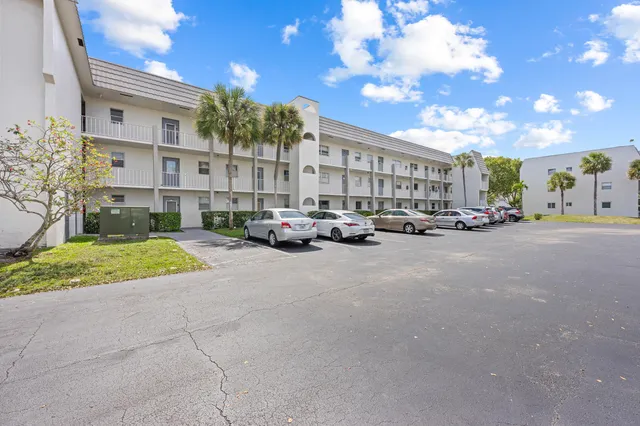 a cars parked in front of a building