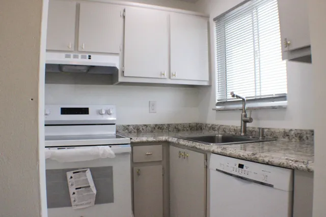 a view of a city with lawn chairs