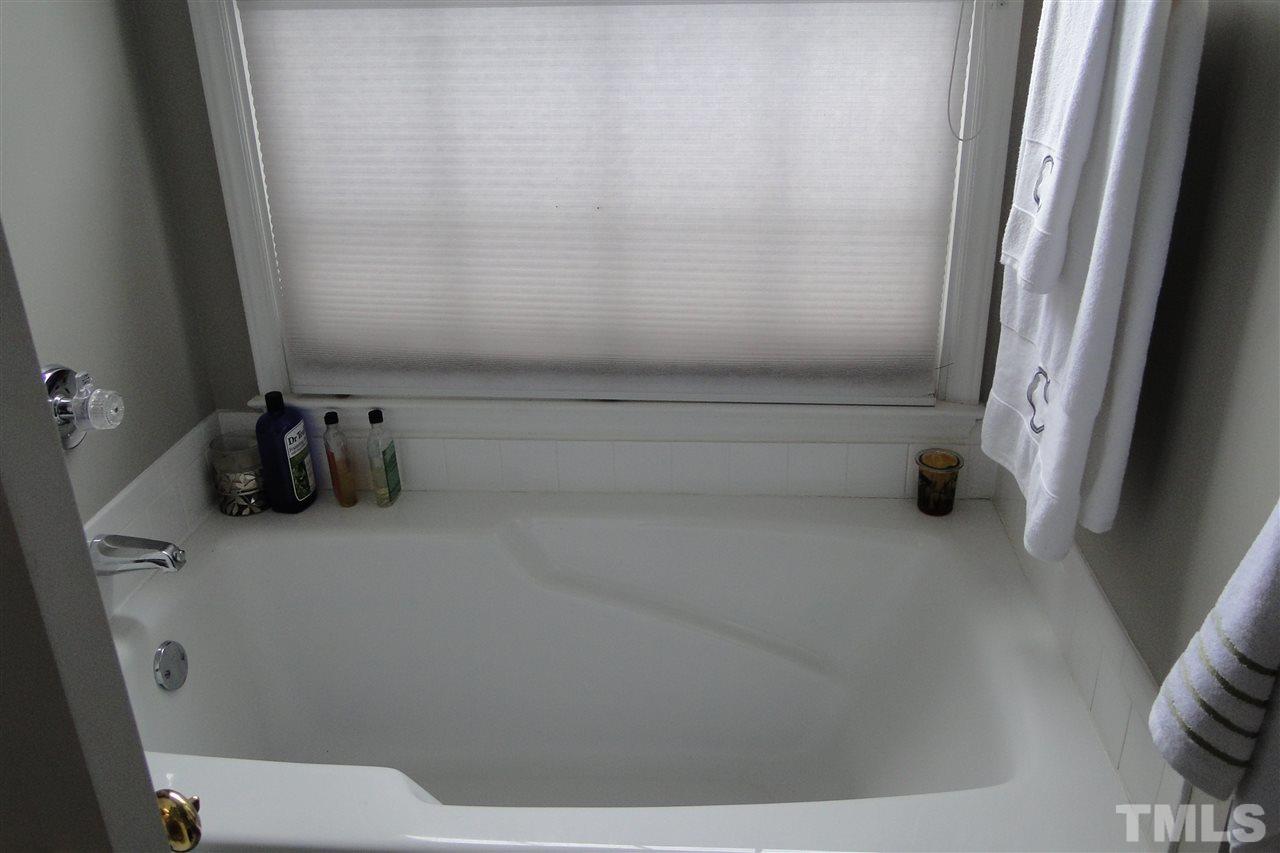 4105 Landrum Lane Raleigh, NC 27616 - Photo 17 of 29 a bathroom with a shower