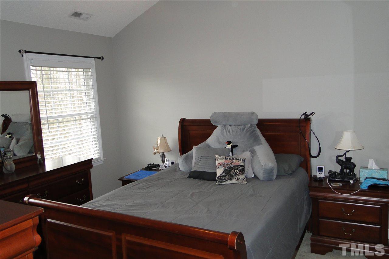 4105 Landrum Lane Raleigh, NC 27616 - Photo 18 of 29 a living room with furniture and a window
