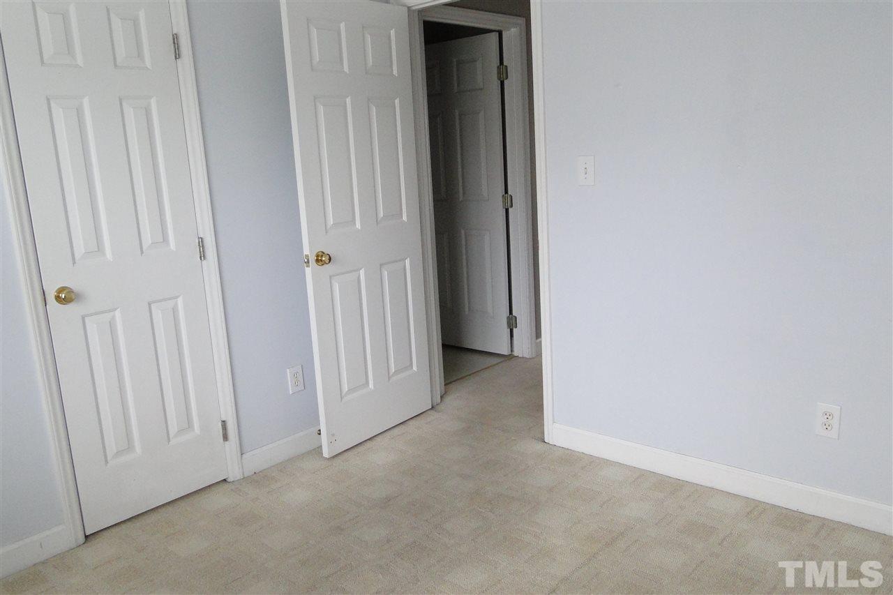 4105 Landrum Lane Raleigh, NC 27616 - Photo 24 of 29 a view of a livingroom from a hallway