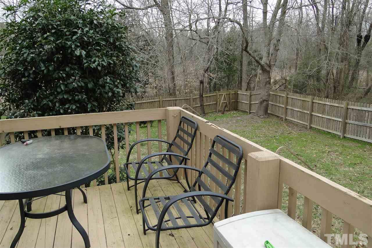 4105 Landrum Lane Raleigh, NC 27616 - Photo 27 of 29 a view of a wooden chairs and table in the balcony