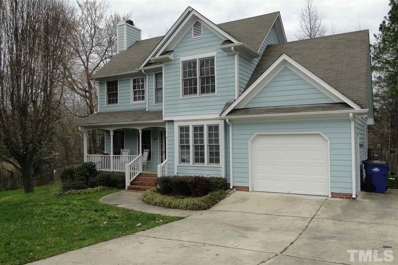 4105 Landrum Lane Raleigh, NC 27616 - Photo 4 of 29 a front view of a house with a yard and garage