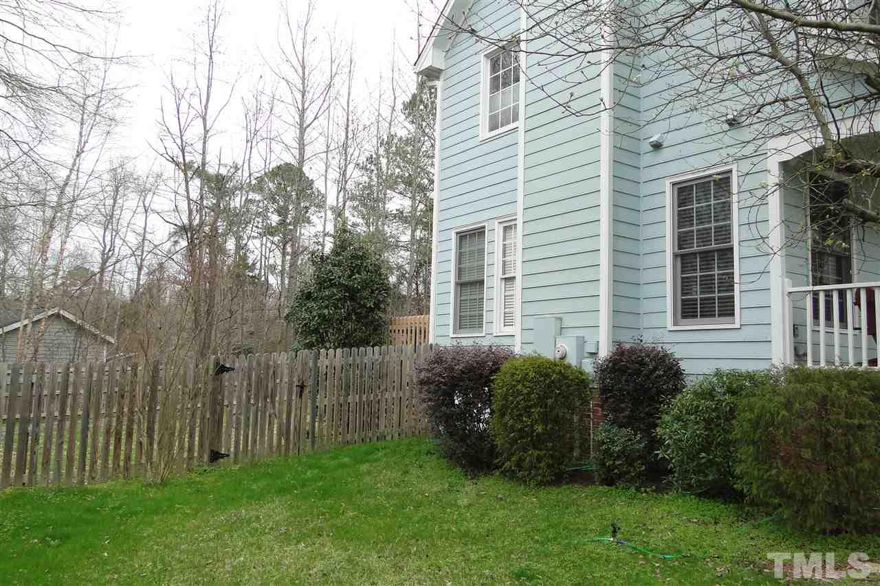 4105 Landrum Lane Raleigh, NC 27616 - Photo 6 of 29 a view of a backyard with plants and large trees