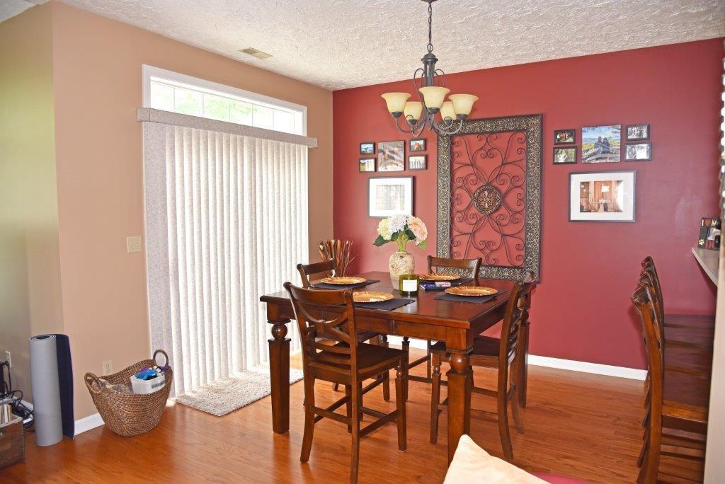 56 Stone Ridge Boulevard, Unit CONDO Hermitage, PA 16148 - Photo 4 of 14 Dining room flows into the kitchen and living room and open to the patio