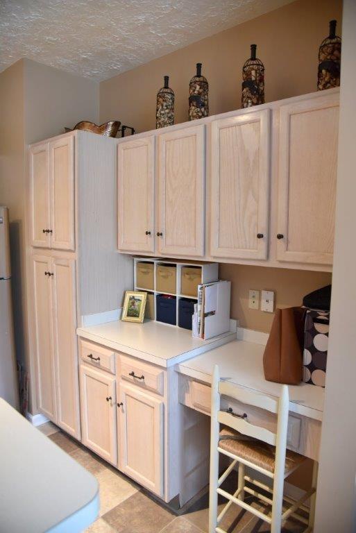 56 Stone Ridge Boulevard, Unit CONDO Hermitage, PA 16148 - Photo 7 of 14 Desk and pantry in the kitchen