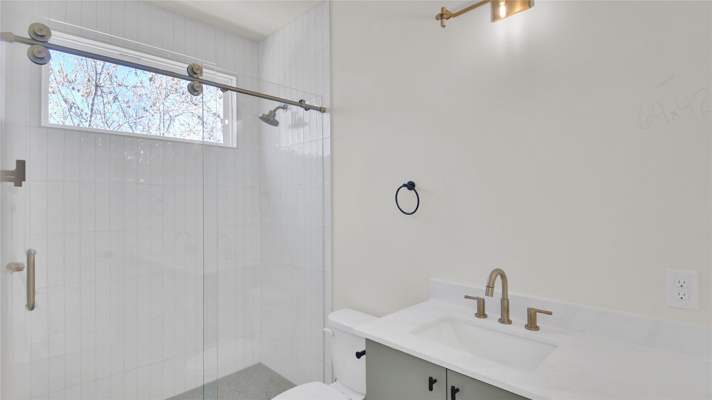 6802 Montana Street, Unit 1 Austin, TX 78741 - Photo 14 of 20 Bathroom with vanity and a shower stall