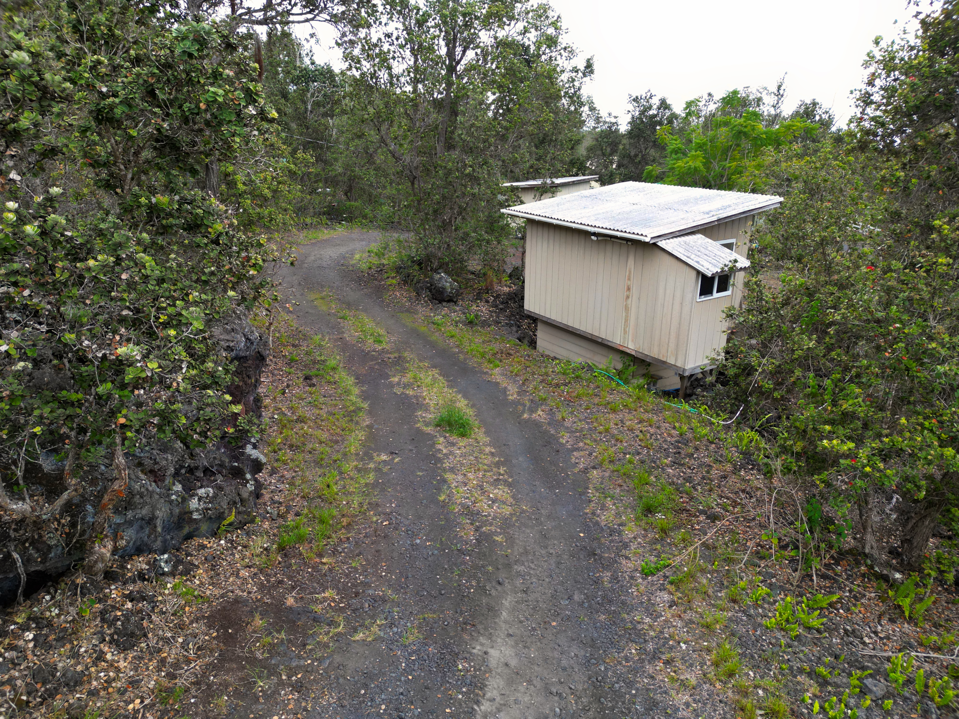 92-1435 Aloha Boulevard Ocean View, HI 96704 - Photo 11 of 28 a view of a yard with a sink