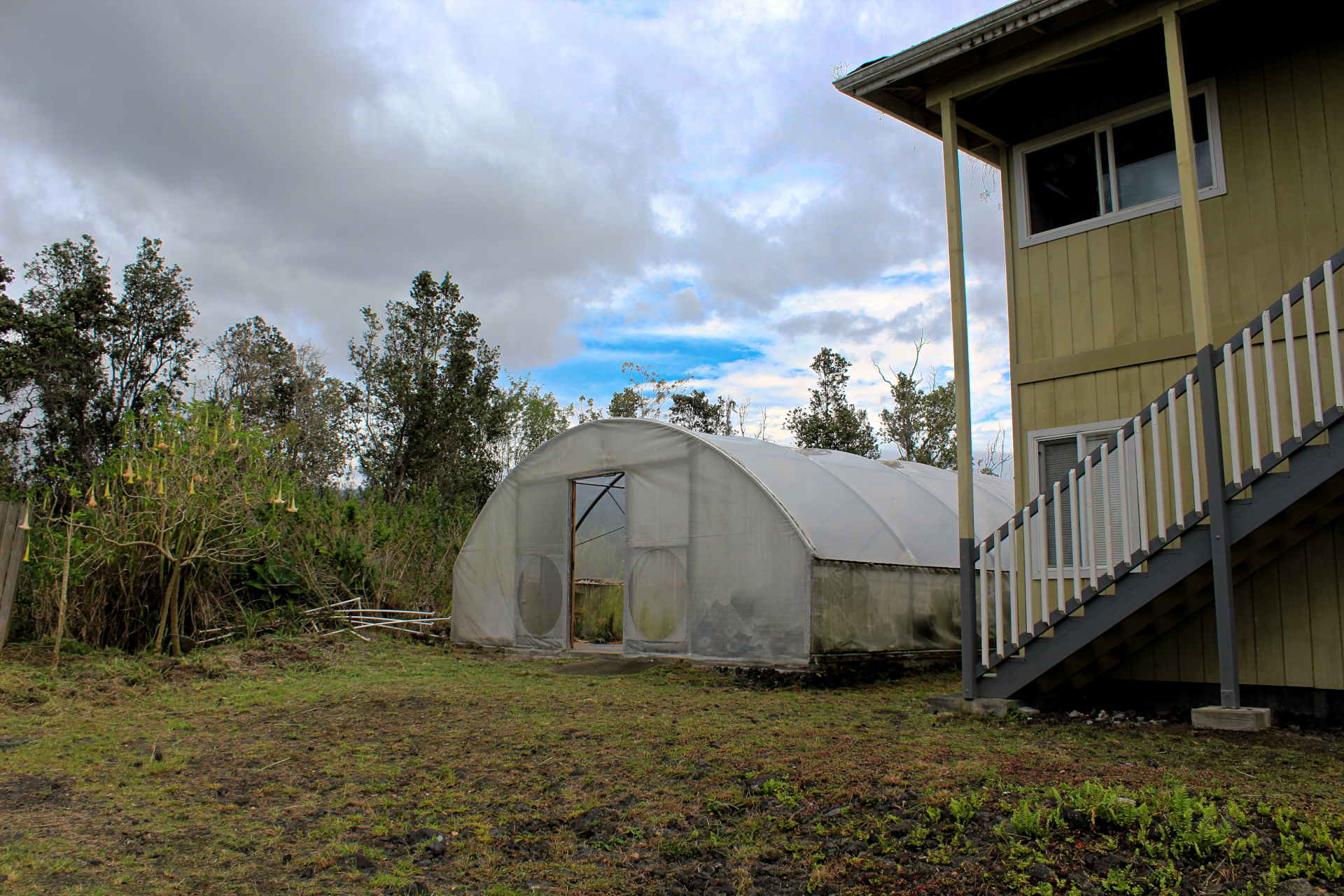 92-1435 Aloha Boulevard Ocean View, HI 96704 - Photo 14 of 28 a house view with a backyard space
