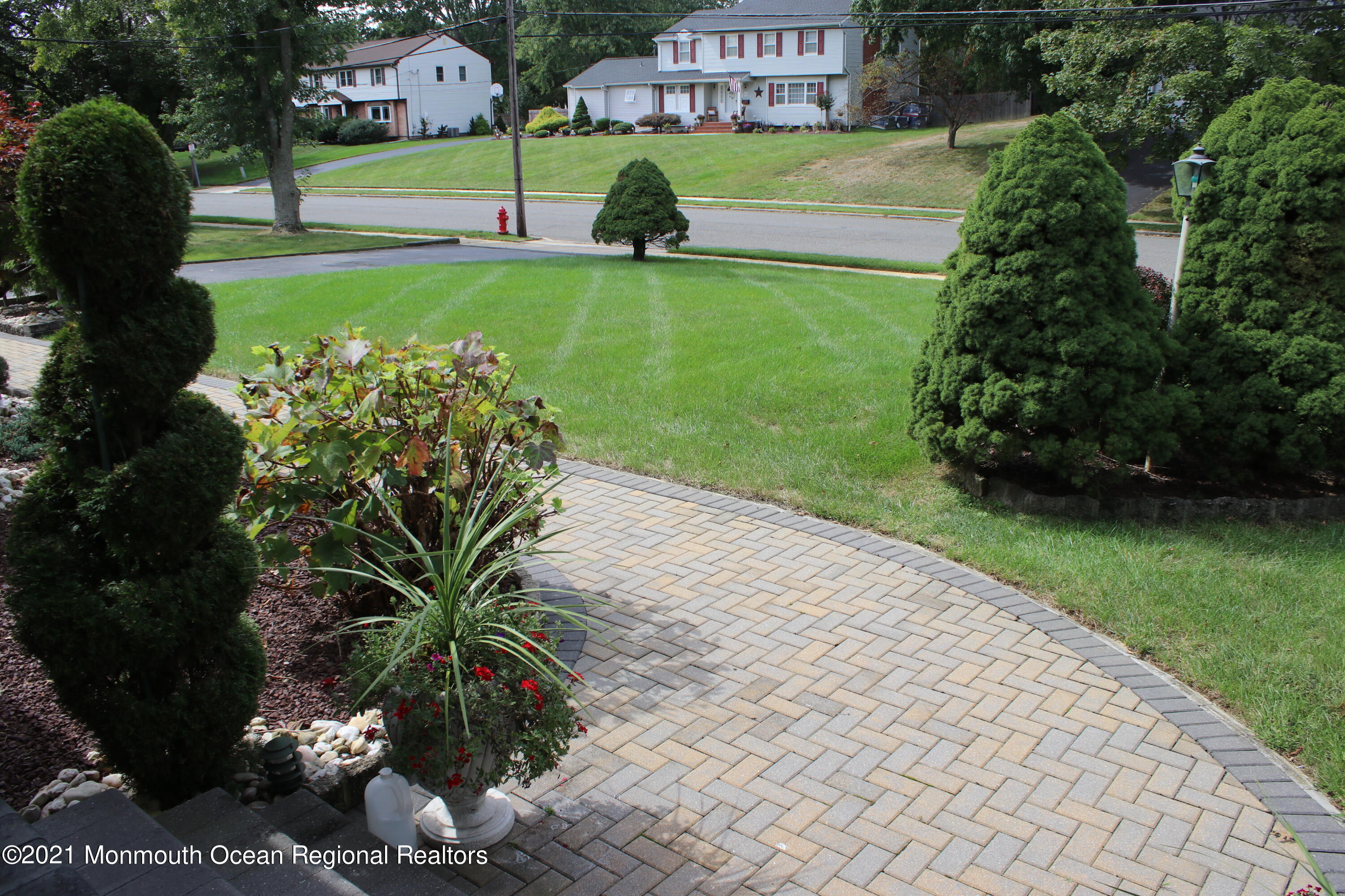 135 Lancaster Road Freehold, NJ 07728 - Photo 3 of 46 a view of a garden with plants