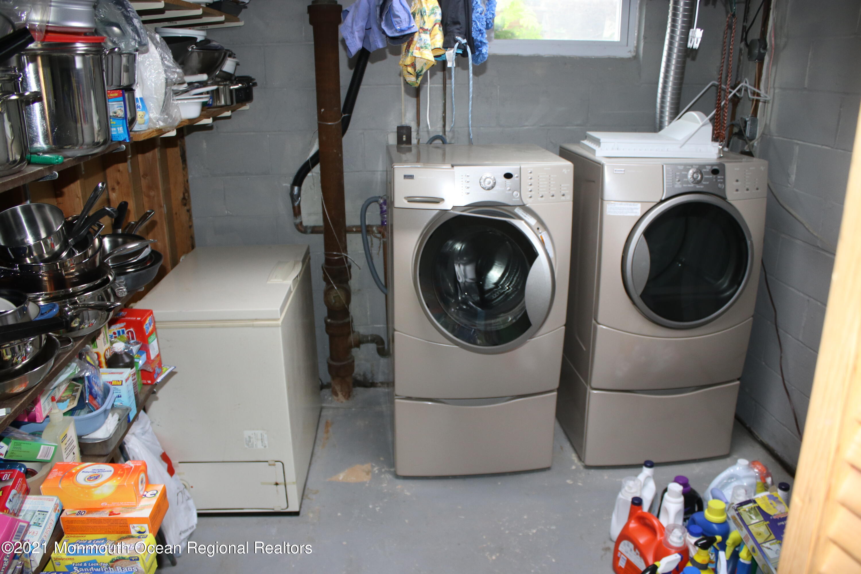 135 Lancaster Road Freehold, NJ 07728 - Photo 36 of 46 a utility room with dryer and washer
