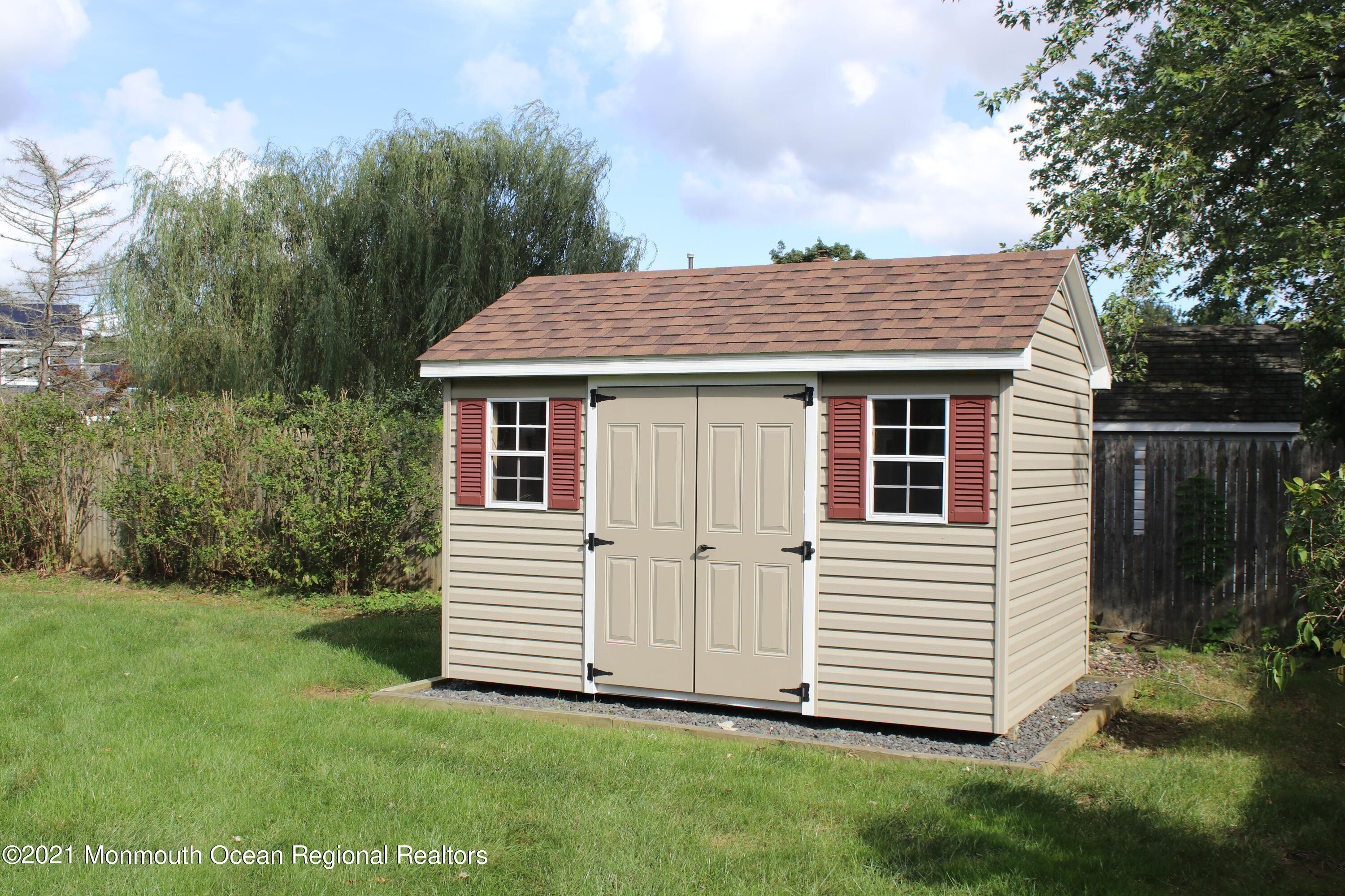 135 Lancaster Road Freehold, NJ 07728 - Photo 46 of 46 a view of a house with a yard