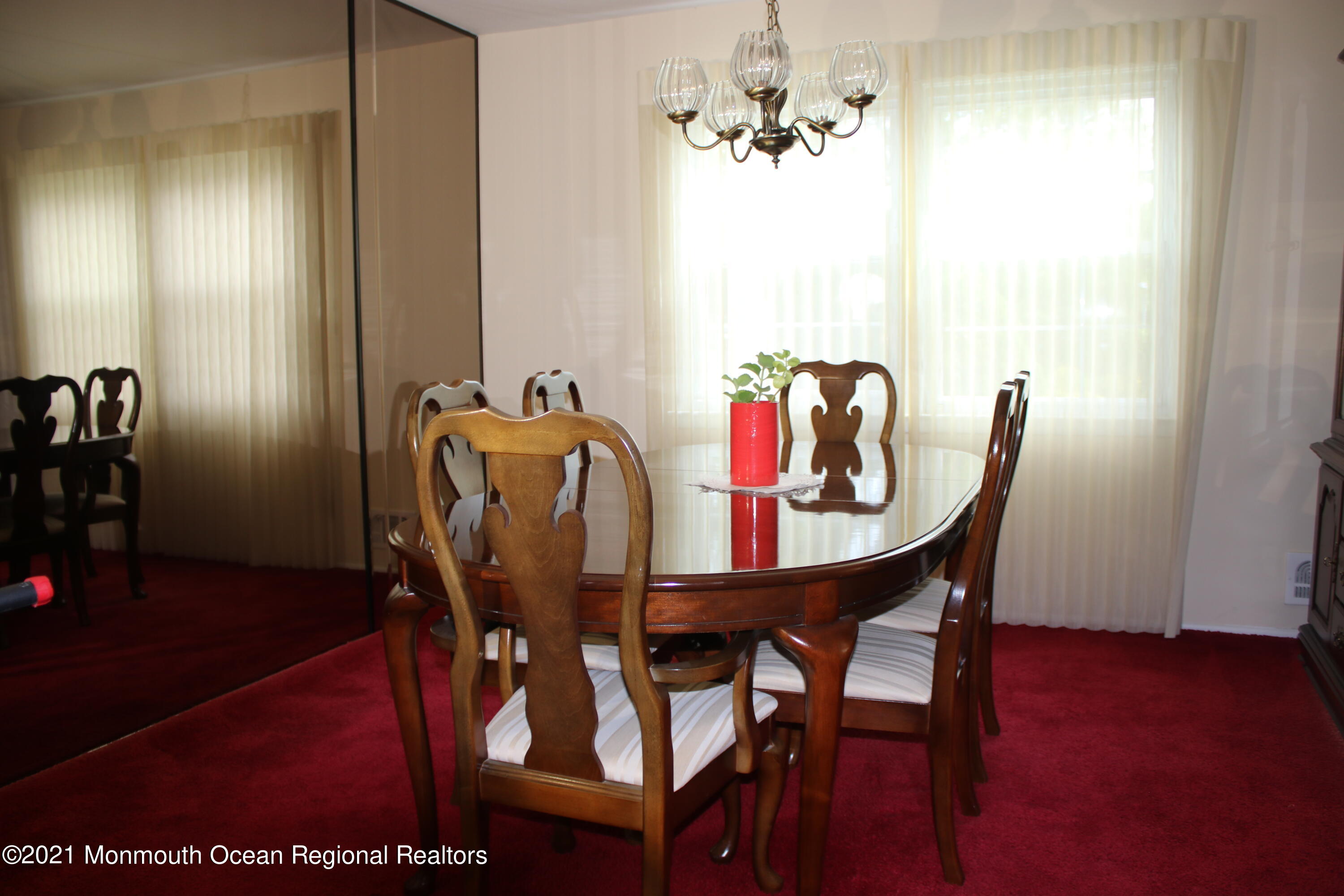135 Lancaster Road Freehold, NJ 07728 - Photo 10 of 46 a dining room with furniture and window